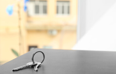 Keys from house on table in room