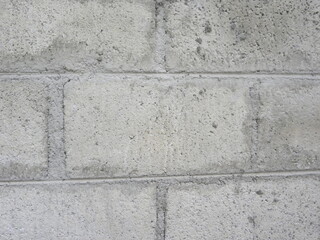 Gray rustic concrete brick wall textured background
