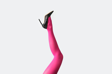 Obraz premium Beautiful young woman in tights on light background