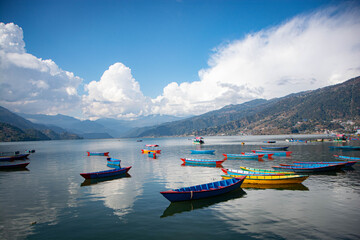 Fototapeta na wymiar Colorful bort on Pokhara Lake in Nepal