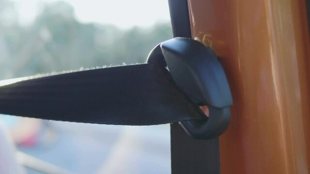 Close-Up of Seat Belt Inside driving car in 4K Slow motion 60fps
