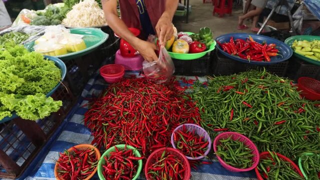 Fresh chilli and peppers sold at farmer's market in Thailand 