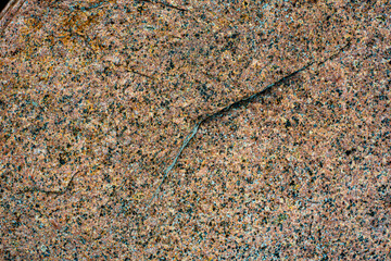Background of granite stones on a close-up