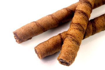 chocolate wafer rolls cookie sticks isolated on white background
