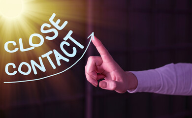 Handwriting text writing Close Contact. Conceptual photo having a history of direct exposure to a...