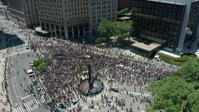 BLM demonstration in Foley Square NYC flying backward and tilting up to skyline