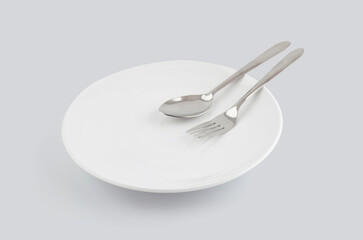 Dish spoon and fork isolated on white background, utensil for food, ceramic plate with empty,...