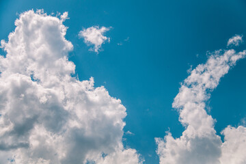 Fototapeta premium Beautiful blue sky and lush white clouds near Bali, Indonesia