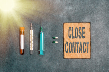 Writing note showing Close Contact. Business concept for having a history of direct exposure to a...
