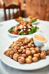 Delicious plate with potatoes and sauce