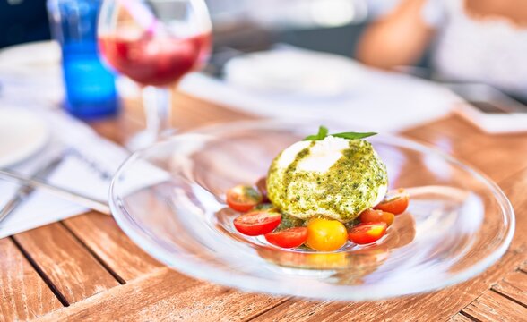 Delicious dish of tomato and burrata cheese salad