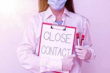 Handwriting text writing Close Contact. Conceptual photo having a history of direct exposure to a...