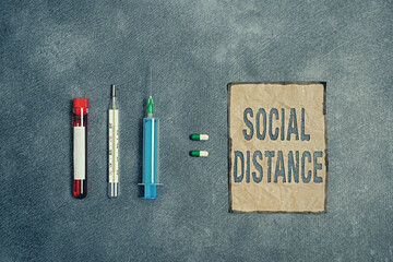 Writing note showing Social Distance. Business concept for degree of acceptance of general...