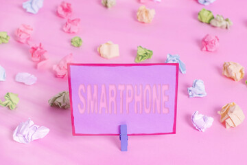 Writing note showing Smartphone. Business concept for a mobile phone that performs many of the...