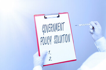 Writing note showing Government Policy Solution. Business concept for designed game plan created in...