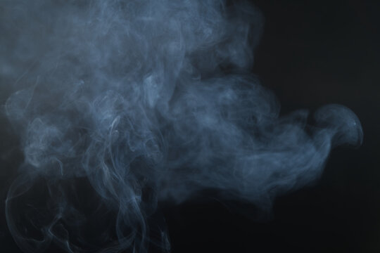White smoke, black background, used as the background image.
