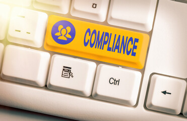 Conceptual hand writing showing Compliance. Concept meaning the action or fact of complying with a...
