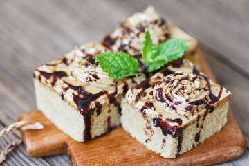 Coffee cake topping chocolate delicious sweet dessert served on the table -