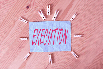 Word writing text Execution. Business photo showcasing it executes or imposes a program order or...