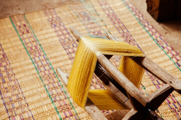 Yellow silk thread traditional sericulture of Thai silk