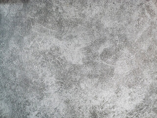 Fototapeta premium background copy space texture of abstract dark grey tinted stone concrete wall or ground scratches crack sand old aged worn grunge mood feeling effect, blank wallpaper canvas for texturing photographs