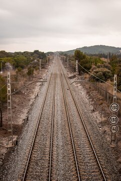 Top view of a double track railway in autumnal colors