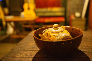Vietnam tea in a small traditional pot served in a cafe in Hanoi, Vietnam