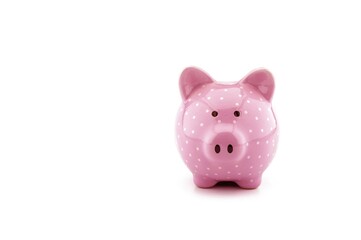 Pink piggy bank isolated on white
