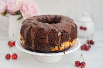 chocolate cherry sponge cake with chocolate frosting