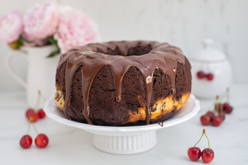 chocolate cherry sponge cake with chocolate frosting