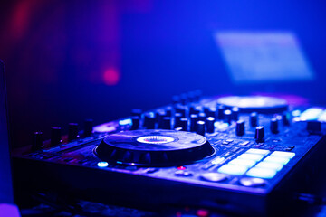 Fototapeta na wymiar music controller mixer DJ Board at an electronic party