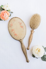 Vintage mirror and hair brush