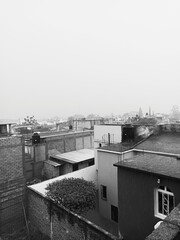 Small City from mexico after a rainy day. a black and white phoyograph that transmits sadness
