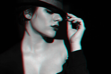 dramatic portrait of sexy young girl in black hat with lipstick