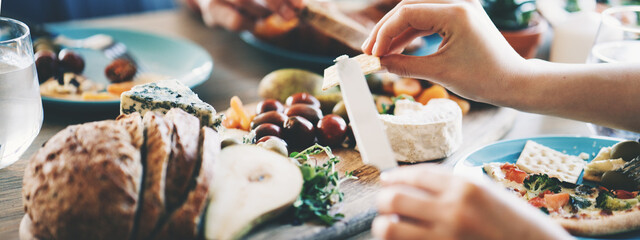 Delicious and tasty food on the table. Bread and butter close-up. Wide screen, panoramic