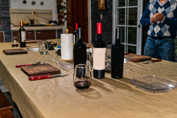 The concept of wine consumption. Wine bottles, glasses. Bottles of wine with space to writing.Space to write text.