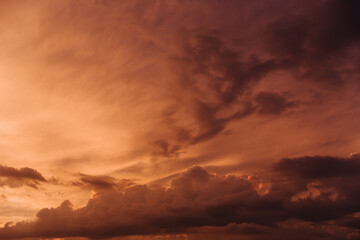 Beautiful sky with orange clouds in sky at sunset . Natural background.