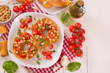 Friselle with tomatoes and chickpeas.	
