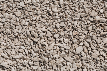 Background of gray crushed stone different forms