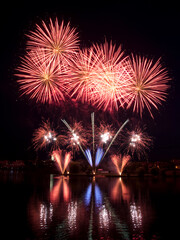 Fototapeta na wymiar Colorful Fireworks for the Grand Finale over Lake