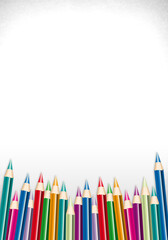 Assortment of Color Pencils on texture background.