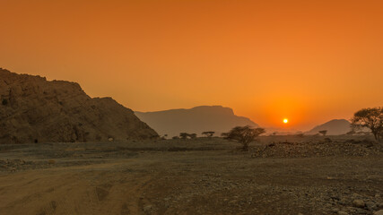 Fototapeta na wymiar sunset at jabal jaisam valley in Dubai