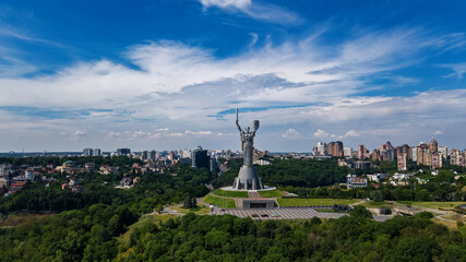 Fototapeta premium Aerial drone view of Kyiv city hills and parks from above, Kiev cityscape and skyline in spring, Ukraine 