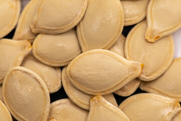 Pile of pumpkin or squash seeds close up