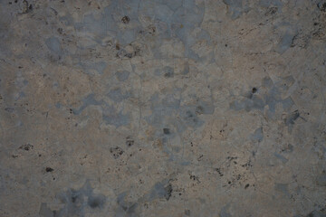 Pattern of old grey concrete surface cracked making the concrete mortar shown up