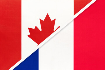 Canada and France, symbol of national flags from textile. Championship between two countries.