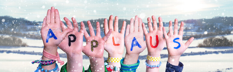 Children Hands Building Colorful German Word Applaus Means Applause. Snowy Winter Background With...