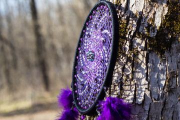 Handmade dream catcher with feathers threads and beads rope hanging