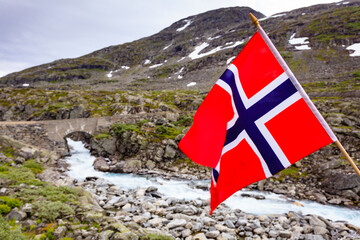 Norwegian flag and mountains landscape