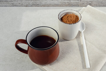 Fresh hot drink from carob and carob in powder without caffeine